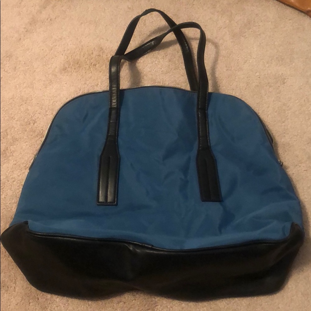 Black & deep seafoam green bag